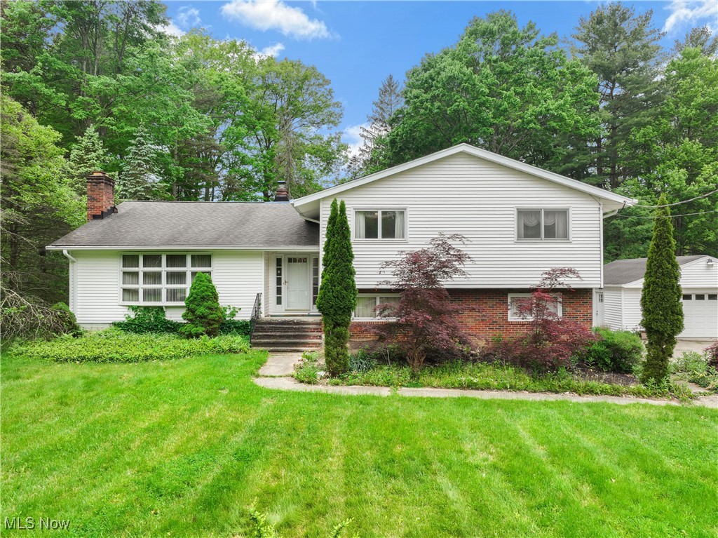 Bring your flair for decor to this One Owner Custom Built 4 Level Split on .93 of an acre that abuts Oxbow Lagoon in the Cleveland Metro Parks* The home features an: Eat-In Kitchen w/ Granite Counters and all appliances are included* Living Room w/ Vaulted Ceilings and Wood Burning Fireplace* Master Bedroom w/ Full Bath and Walk-In Closet* 2nd Kitchen and a Full Bath in the den area that could be a Teen or In-Law Suite* Lower Level Family Room w/ Wood Burner* Newer Zoned Hot Water Heating System* Newer AC System* All the walls have had foam injected insulation* All this and the Metro Parks and Oxbow Lagoon in your backyard* This is a Nature Lover's Retreat* Call for your private showing today!!!