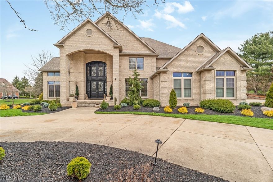 Timeless, elegant, and versatile with character around every corner. Welcome to 1311 Chantilly Circle, a stunning custom build on a  premier lot in the sought-after Lakes at King's Creek neighborhood. As you enter the two-story foyer, attention to detail is palpable as the natural light engulfs the space perfect for relaxing. A formal living room and inviting dining room complement the entrance foyer. The sprawling gourmet kitchen is a host's dream, highlighted by a massive granite island, new Quartz countertops, and recently-replaced appliances throughout including a Wolf double oven and a gas cooktop. The expansive family room adjacent to the kitchen has a full bar and abundant space for entertaining. A private office tucked away off the family room has a full bathroom complete with a steam room for your convenience, this retreat could easily double as another first floor bedroom suite. Have guests visiting? A private in-law suite has a freshly-remodeled kitchen, living room, bedroom, and full bathroom. Upstairs, you'll find four bedrooms including a primary suite with new quartz countertops. Each bedroom offers access to updated bathrooms and roomy walk-in closets. The lower level is highlighted by yet another potential in-law suite with an oversized family room, freshly remodeled kitchen, laundry, bathroom, and a bonus room with a walk-in closet that could easily double as a bedroom. Find solace in your outdoor oasis with a tiered patio perfect for unwinding with family & friends sitting by the fire and enjoying food from the built-in gas grill. As an added bonus, a dog grooming room is attached for those four-legged family members in need of pampering. Adding to the curb appeal is professional landscaping, newly updated irrigation, sprinkler system, and outdoor LED ighting. Located just across the street from Gervasi Vineyards and minutes from the amenities of Belden Village, this one has to be seen in person to be believed. Set up your private tour today!