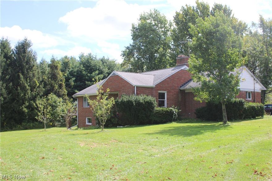 Come see this fixer-upper special! This property has tons of potential located on a breathtaking lot. 3 Bedroom Ranch home with 2 full baths and walk-in laundry room. Three cars detached garage with 2 more addition outbuildings on the property as well, full unfinished walkout basement and last but not least a walkout deck off the master to enjoy your morning coffee. Green Shed does not stay with property.