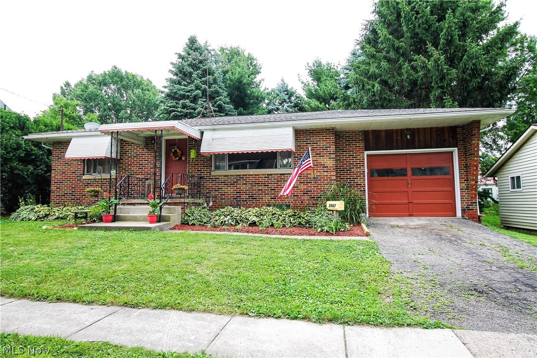 Welcome home to this stunning landscaped brick ranch! All the work has been done, all you need to do is move in! There is a beautiful open family room awaiting you with gorgeous wood floors through out the home. The open kitchen has gorgeous concrete counters, wood floors, stainless steel refrigerator new 2017, newer modern lighting, subway title back splash. The eat in area has sliders where you can step out onto your deck and patio, enjoy your peaceful backyard retreat! The bathroom has been updated, newer ceramic floor, vanity, toilet, all new plumbing 2018. Basement is partially finished and is currently being used as a recording studio. The basement floor has new drains in 2018. The wonderful backyard is all fenced which includes a built in bar and hot tub to enjoy with family and friends. Updated new fixtures 2018 throughout the home and updated electric 2013, 150 AMP Panel. Water main was updated with a quarter turn valve in 2013. Roof was redone in 2010 and the furnace was in 2