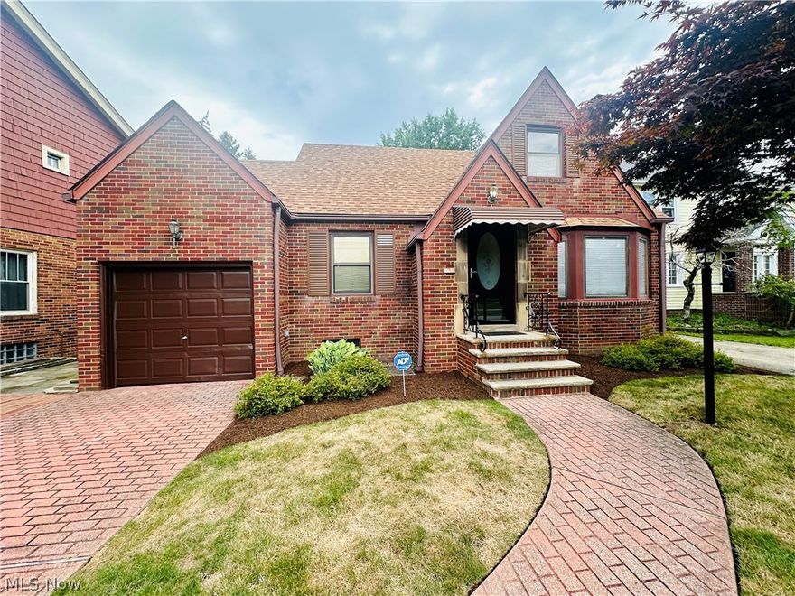 Welcome to 3923 Monticello Boulevard! This beautiful all brick cape cod boasts a classic architecture and a generous floor plan.

This 1498 sq ft 3.bd 1.5 bath, first floor primary bedroom home has been meticulously maintained  with traditional brickwork and features freshly and professionally installed elegant landscaping, creating a welcoming atmosphere for entertaining or just for your own enjoyment.

Upon entering, you are greeted by a foyer that leads into a thoughtfully designed living space. Large Pella windows (with inset blinds) flood the rooms with natural light, highlighting the newly reconditioned hardwood floors. The living room is ideal for entertaining or simply unwinding with loved ones, complete with a cozy fireplace as the focal point.

The kitchen is a chef's delight, featuring modern appliances, ample counter space, and  lots of natural light. Adjacent to the kitchen is a dining area that is perfect for family meals or hosting guests.

The first floor primary bedroom provides easy access to the main level activities, such as the kitchen, living room, a private sunroom, and a full bath without having to go up and down stairs. 
Upstairs, the bedrooms are spacious and well-appointed, each offering comfortable retreats with ample closet space. The bathrooms are beautifully updated, featuring contemporary fixtures and finishes that enhance both style and comfort.

The finished basement offers the opportunity to create a fabulous entertainment space with unlimited potential. 

The backyard of 3923 Monticello Boulevard is a private oasis, complete with mature trees for shade, and a patio area that is ideal for outdoor gatherings or quiet moments of relaxation. The property also includes a garage and additional parking space, ensuring convenience for residents and guests alike.