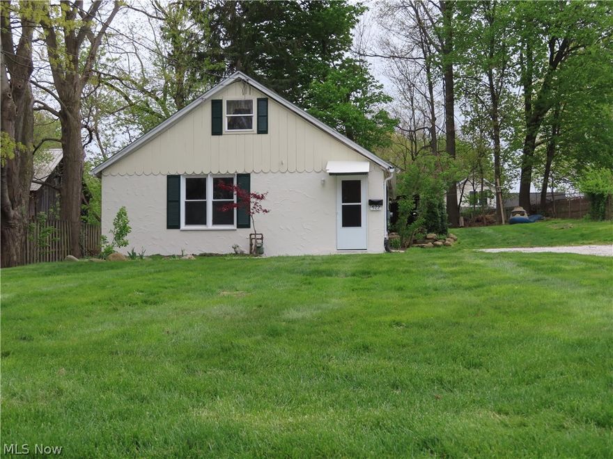 Enjoy the country setting within the City of Kent in this 4 bedroom(2 upstairs bedrooms have individual electric heat ), 1 1/2 bath home with mostly newer windows ( 2019 ) which sits back off the road. Stucco exterior,  main newer roof ( 2019 ), sloped roof over utility area replaced  May of 2021, 27 X 12 foot concrete patio with terraced timbered walls. The basement is partial, the first level utility room provides good storage area. Gravel driveway with turnaround. Very attractive pricing on this move in ready home.  2-10 Home Warranty included for buyer with home purchase.