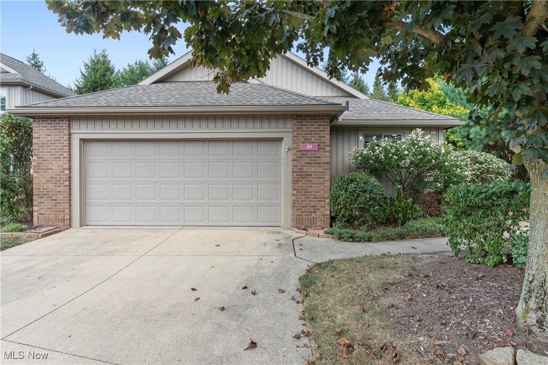 Tucked away on a quiet cul-de-sac, this home offers the perfect blend of privacy and convenience. Mature trees surround the property, giving it a tucked-away feel while still being close to everything you need. Inside, you’ll find a welcoming foyer that opens into a bright and airy living room with vaulted ceilings and a cozy fireplace—the perfect place to relax or gather with friends and family. The open dining area connects seamlessly to the kitchen, where you’ll enjoy an abundance of cabinetry, an eat-in space, and peaceful views of the foliage outside. The primary suite is a true retreat with its spacious vanity offering plenty of storage, a walk-in shower, deep linen closet, and generous walk-in closet. Two additional bedrooms provide flexibility, whether you need guest rooms, office space, or a hobby room, one even includes built-in shelving for extra organization. Everyday tasks are made easy with a main-floor laundry room complete with cabinets, shelving, a utility sink, and an electric dryer hook-up. A two-car garage with hot and cold water adds even more functionality. The finished lower level adds incredible living space, featuring a large open rec area with an electric fireplace—ideal for movie nights, game days, or simply stretching out. The utility room offers a utility sink, sump pump, and more than enough room for storage. Step outside to your private brick patio, surrounded by lush greenery—a peaceful spot for morning coffee or just relaxing. With kitchen appliances included and thoughtful storage throughout, this home is move-in ready and waiting for its next chapter.