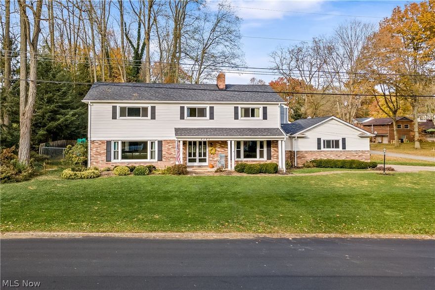 Welcome home to this expansive Akron Colonial at 2121 Brookshire Rd. As you walk inside, take a moment to enjoy all the natural light beaming in from the oversized picture windows in both the Family and Living rooms. As you make your way into the eat-in kitchen, notice the double wall ovens, wrap around countertops, and ample amount of storage. Never worry about space or not having enough seats for your family and guests as you continue into the adjacent Dining room, capable of seating 10 or more! Wonder over to the Family room to enjoy cozy evenings in front of the fire or move your entertainment into the flex room and out into the backyard on the brick paved patio. Heading upstairs, be pleasantly surprised with the Master Suite which offers its own fireplace, bathroom, vanity room, and a room-sized closet - could also double as a nursery. Down the hall are 3 more enlarged bedrooms, a full bathroom, and a laundry room. The basement features more space to entertain in its partially fin