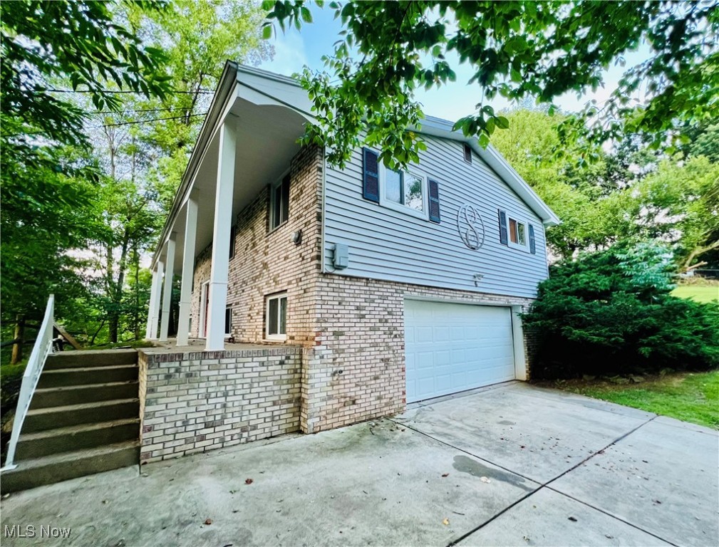 Welcome to 6 Poplar Dr- A stylish 3 bed, 2.5 bath brick home tucked away on a quiet cul-de-sac. Featuring a brand-new kitchen with granite countertops, stainless steel appliances, and an open layout perfect for entertaining. Enjoy hardwood floors, updated baths, a spacious primary suite with tiled shower, and multiple living areas for work play. Outside, relax on the covered patio or enjoy the large backyard.
