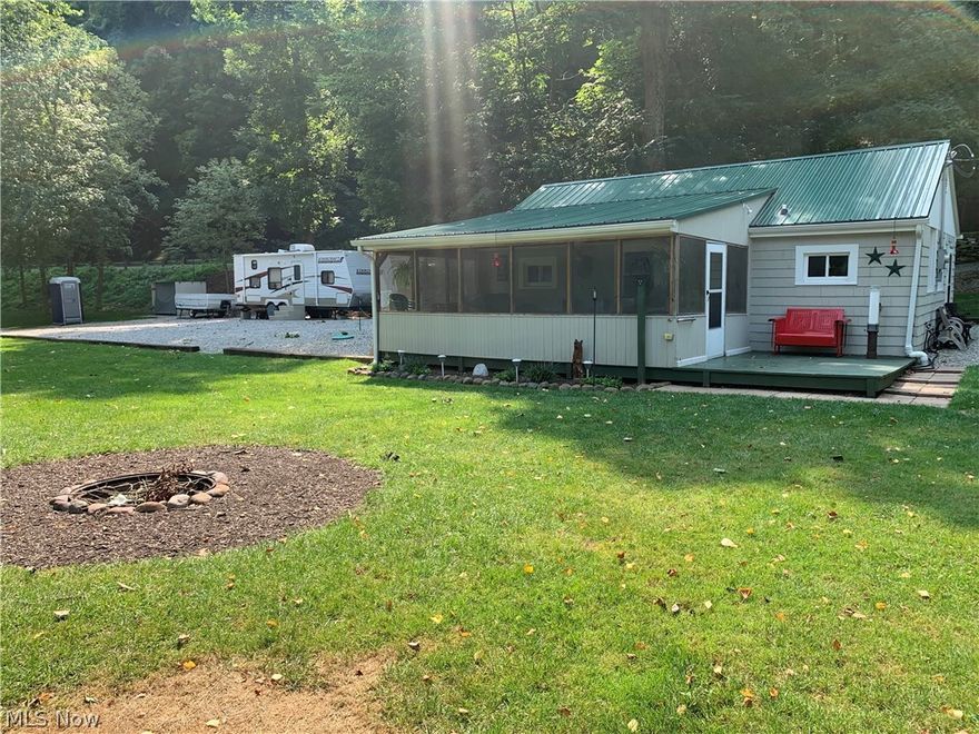 A little piece of heaven on the River is how the owner describes this block cottage! Over 250' of river frontage on this .672 Acr piece of Mochican Country paradise.2 bedrooms,1 bath, Kitchen and Living Room complete with furniture & kitchen necessities. Block walls, stainless kitchen & nature stone floor ease the maintenance.An inviting screened porch is where you will love to sit on the swing or have a gathering at the oversized picnic table.Large fire pit.10x20 shed with equipment to take care of the property. Large limestone parking area .Wood shed. Benches by the river.Jump in your car and enjoy this turn key get away & invite your friends to bring their camper.