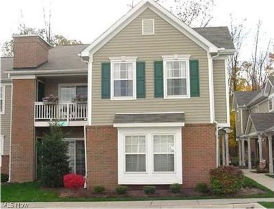 Best value at Lenox Village! This beautiful 2 bedroom condo home is priced to sell. Cathedral ceilings soar through the living room and master bedroom! Open kitchen gives way to dining room and living room. Slider off of living room to private, covered balcony and mechanical room. Bright, spacious, has vaulted ceilings, neutral décor, and quiet with beautiful woods in the back.  Revere Schools! Great location. All appliances stay! Easy to show, ready to move in! Best value at Lenox Village! Call today!