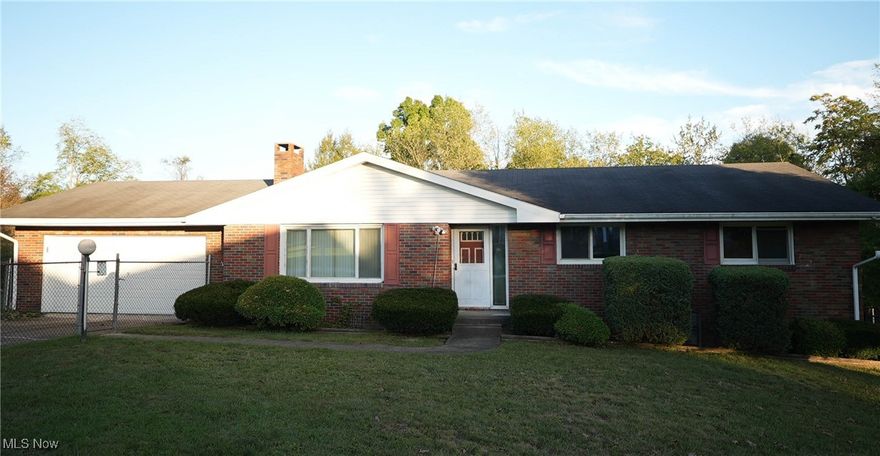 This lovely home on just over an acre offers incredible potential in a great location — just minutes from Oglebay Park, downtown Wheeling, and West Liberty University. Featuring three main-floor bedrooms, 1.5 baths on the main level, and a full bathroom in the basement, this property is ready for your personal touch. With solid bones and a spacious layout, it's the perfect opportunity for renovation or customization to make it truly your own. Enjoy the peace of rural living with the convenience of nearby amenities and attractions!