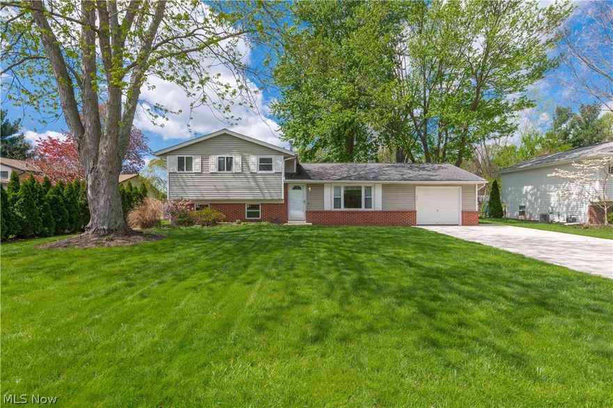 Welcome home to this stunning, turn-key split level in a prime North Ridgeville location! From the moment you step inside, you’ll love the seamless, open-concept flow—perfect for modern living. This home is truly move-in ready, featuring brand-new carpet, a fresh neutral palette, and a sleek kitchen equipped with stainless steel appliances. Major upgrades provide total peace of mind, including a new driveway, updated replacement windows, and fully renovated, contemporary baths. Step outside to your private oasis: a massive, private backyard featuring a handy storage shed and plenty of room for summer hosting. Situated in a highly sought-after neighborhood-- Schedule your showing today!