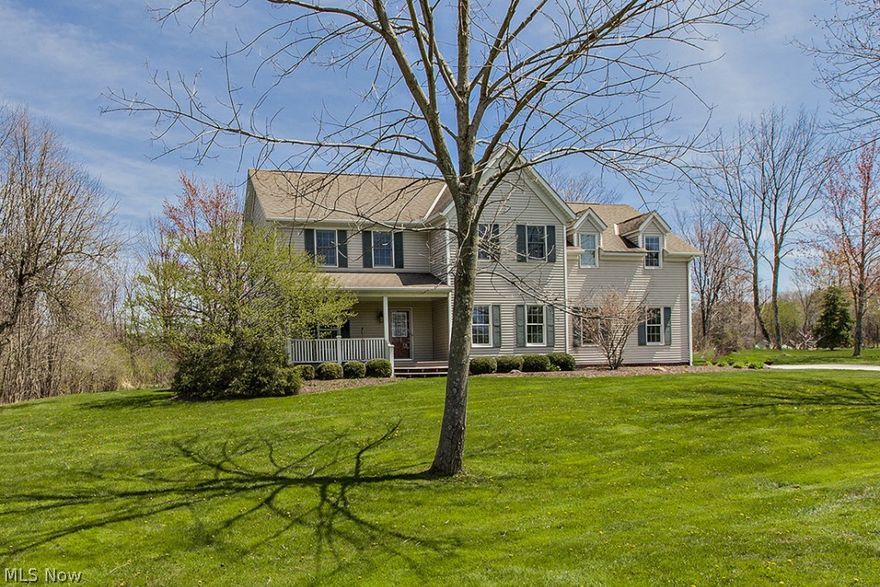 Special home on 2+ acres!  Open floor plan with lots of window for sunlit rooms and view of nature.  Vaulted ceiling great room with fireplace.  Outstanding kitchen with newer granite and tile backsplash.  Dining area with sliders to deck.  Office or sitting room with French doors and built-in shelving off foyer.  Wood floors on first floor.  Back hall with tiled floor, coat closet and walk-in closet.  Laundry room on first floor with planning desk and wall cabinets.  Stunning master suite remolded bath and walk-in closet.  Three additional bedrooms and two bathrooms complete the second floor.  Finished lower level.  Over $25,000 in improvements over the last 4 years.