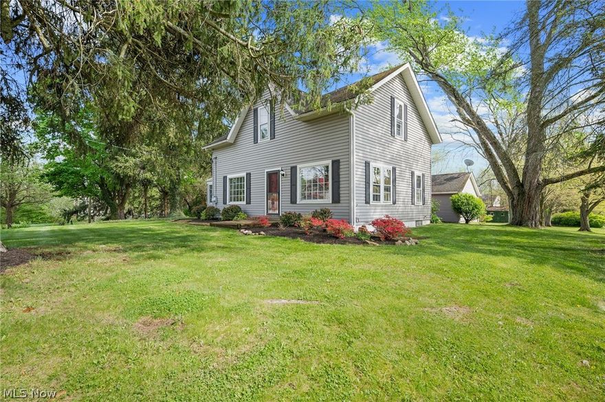 Schedule your viewing of this stunning home in Copley, Ohio! Situated on 1.14 acres, this property has both country charm and convenience. Inside, original features such as hardwood floors and detail bring out character. The main level features a cozy living room, dining room, and updated kitchen. Upstairs, 3 bedrooms offer wonderful storage space with walk-in closets. Outside, enjoy the expansive yard with mature trees, two outbuildings, and a two-car garage. Close to shopping and dining, this home offers the perfect blend of history and modern living!