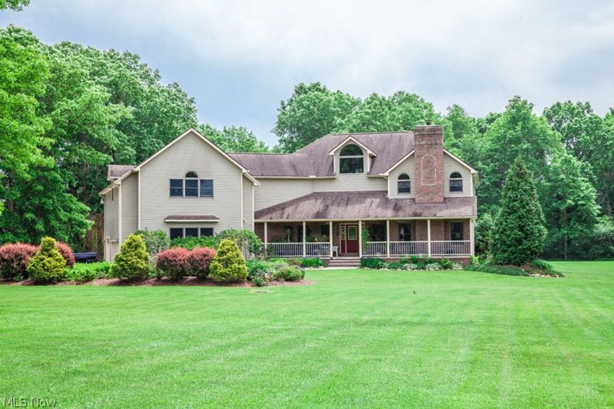 Welcome to this meticulously cared for 2 story Colonial on 3.5 acres in beautiful Cuyahoga Falls.  This home features an open floor plan that allows for ample outdoor lighting. From the minute you enter the Foyer, the Oak woodwork flows throughout the entire home. Both the Living Room and the Great Room have fireplaces. The breathtaking kitchen with custom cherry cabinets and a massive center island will provide for all your cooking needs. Off of the kitchen is the Sunroom with a hot tub that leads to the enormous Deck and above ground pool.  The huge Master Suite allows for plenty of closet space, a spacious master bathroom and a walk out deck that overlooks the property and above ground pool.  The fully finished lower level features all the amenities perfect for entertaining:  wet bar, wine cellar, recreation room and home theater.  The endless garage space, security system, built-in sound system and spacious property are just some of the many upgrades featured in the home.  Call for