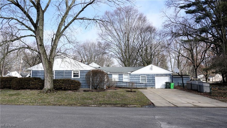 Incredible potential in the Silver Lake Highlands area of Stow. Centrally located near highways, main thoroughfares, schools, shopping and dining, this sprawling 2,033 Sq. Ft. ranch has a flexible 5 bedroom/2 full-bath layout that will meet almost anyone’s needs. Outfitted with accessibility ramps at both the front and rear entrances as well as an accessible full bathroom, this home provides a rare option for buyers. The 5-bedroom floor plan gives you the alternative to convert one bedroom into a home office, an eat-in kitchen with plenty of cabinet space, an over-sized living room with a large picture window, and a smartly located formal dining room. The first full bath is equipped with a shower/tub combo and single vanity while the second bath sports a walk-in shower stall and single vanity. A practical space near the rear entry, previously used as an office, is well suited to be transformed into a mudroom or main-floor laundry. The full, unfinished basement currently houses the laundry as well as dual hot water tanks that were updated in 2010 and 2013. The large basement provides plenty of space for storage or you could choose to renovate the space into a sizable recreation room. Outside, the corner lot has a surprisingly large fenced-in backyard, matching wooden storage shed, and an in-ground basketball hoop. Rounding out the exterior is a 2-car wide paved driveway and a single-car garage. Updates Include: Dual Hot Water Tanks – 2010 and 2013. Call your favorite realtor today so you don’t miss out. This one won’t last!