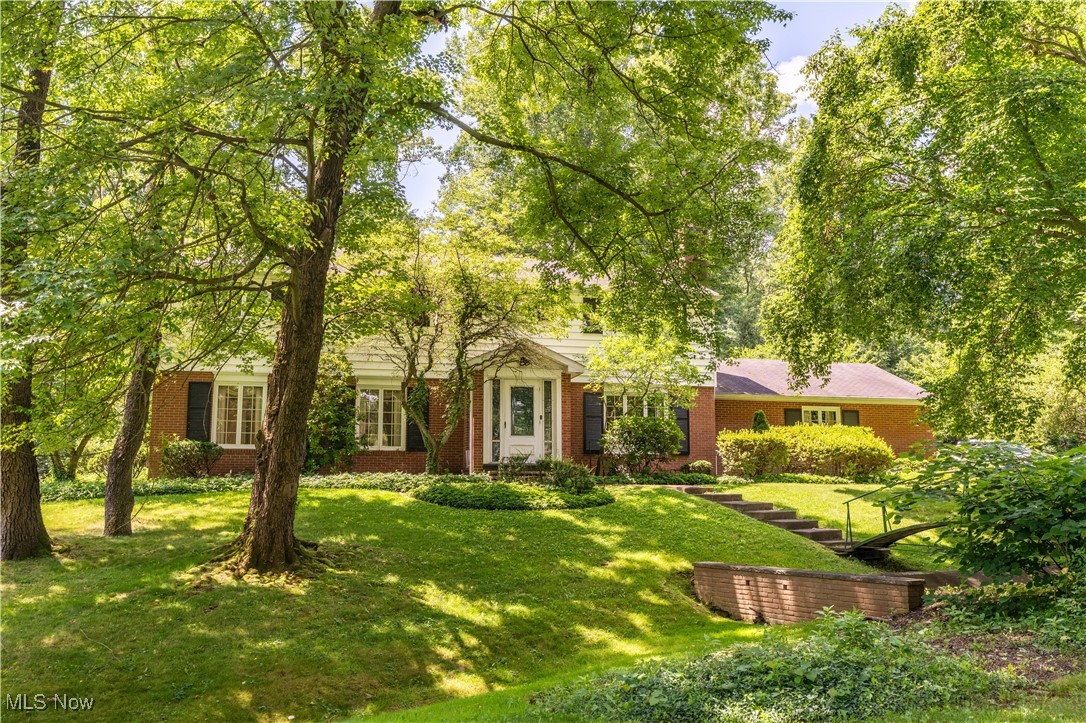 Welcome to this 4 bedroom 2 and 1/2 bath Brick colonial in Plain township. This home has a beautiful park like feel while sitting on two parcels with plenty of space to enjoy! Drive up to the home on a longer driveway with plenty of parking. This home is a colonial brick with character and style. It has been truly the home for many parties and gatherings to Stark County of the years! The beautiful oversized all seasons room with windows all around will be a great place for holiday decorations and family gatherings or to sit and enjoy the view! A large deck off of the all seasons room for summer cookouts and outdoor entertaining! Relax in the study with a fireplace that can be a private at home office! Four large bedrooms and two full baths on the second floor to accomadate a large family or guests! This home is one of a kind! Call for more details or to book a showing!