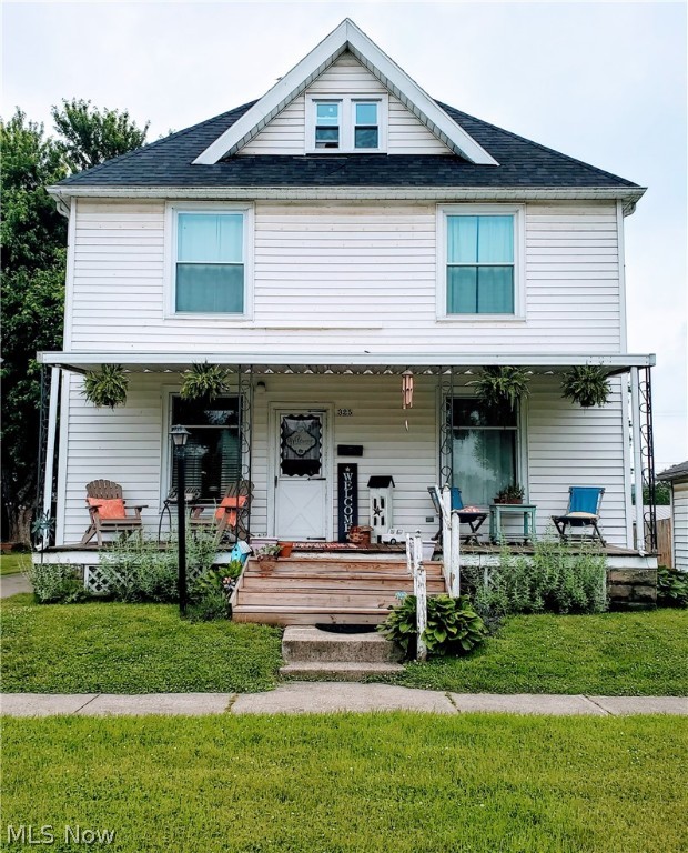 If you are looking for a nice, spacious home with some character, this might be the one for you! It offers 2,043 square feet plus a finished attic, plenty of natural light, original woodwork and hardwoods underneath the carpet. The first floor consists of a living room, family room, dining room, kitchen, laundry, and full bath, while the upstairs has a large full bath and three nice sized bedrooms. The garage was built in 1995. This home has a newer roof, newer windows, and all new drywall and electric in 2013!