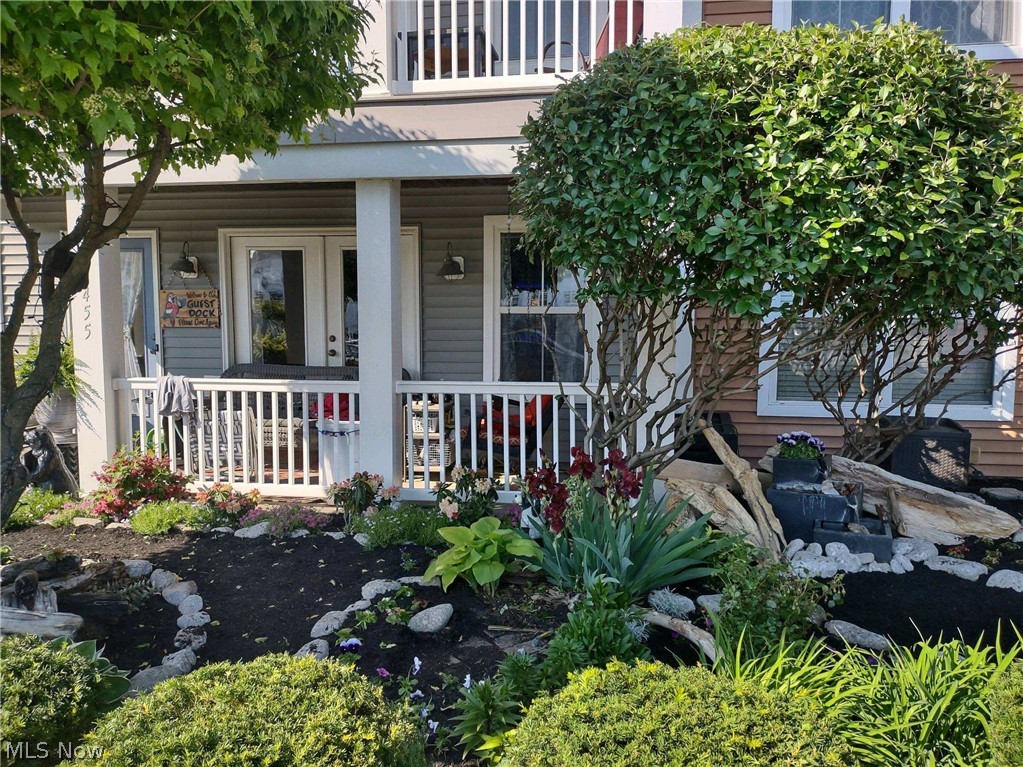 Waterfront Entertainers Dream Home. Larger Harbor Walk Townhome over looking Spitzer Marina. Dock your boat out front walk to the Shipyards restaurant with outdoor dining. Enjoy summer concerts near by Rockin on the River and free water taxis right out the front door. Located next door is the new entertainment center that includes dining, monkey island Coffee shop and event center. This home has been professionally updated and renovated from top to bottom, owner only bought the finest of materials with great attention to detail. The ground floor features a custom Wet Bar, granite and rough cut marble stone, includes a 8ft American Heritage slate top Pool table that has been serviced with new felt and bumpers in 2019, a first floor bathroom, 2 car heated garage hot and cold running water, second beverage refrigerator. Main floor floor features open concept living, custom kitchen with a solid 10ft foot long granite center island farmers sink and plenty of seating. Stainless steel appliances and wine fridge all opens to the large great room with built in whole house surround sound, soothing gas fireplace, nice sized private in home office or 3 rd bedroom and of course laundry. Balcony porches both front and rear with awesome year round views. The quiet upper level contains the owners suite and a guest on-suite. The larger primary suite has plenty of storage, a custom bathroom built for royalty, one of a kind walk in shower, marble countertops relaxing infrared sauna.
