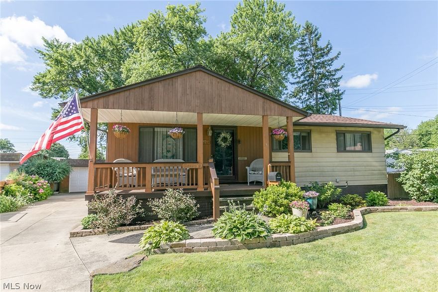 A remarkable 3 bed, 2 full bath Old Brooklyn ranch with over 1300 sq feet of total living space.  This home sits at the end of a cul de sac, and features a lovely covered deck, 2 car garage, and a nice full wood  privacy fenced yard.  The living room is large and open.   The bedrooms are spacious, and there is a dining area off of the galley kitchen.  The finished lower level features a full bath and bar.  There are many updates, including newer roof, furnace, central air conditioning, and more.