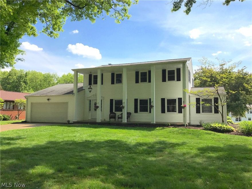 What a stunning home!  Nearly everything has been updated and remodeled.  This home features large and spacious rooms throughout.  The kitchen is gorgeous and really makes the home a showplace...granite counters, soft-close doors and drawers, new stainless steel appliances and luxury Alterna engineered stone floors opening up to the dining area with pegged hardwood floors.  Also off the dining area is a 3-season room with access to the huge back yard. This room could have numerous uses...office, den, etc.  The family room features a brick fireplace and has access to the outdoor patio and back yard as well.  The very spacious living room is perfect for entertaining and would accommodate a large family...it flows nicely into the dining area and kitchen.  The first floor also has a half bath which shares space with the laundry room.  Upstairs has 4 generously sized bedrooms and 2 full baths...which includes the master suite.  An added feature upstairs is a finished area over the garage th