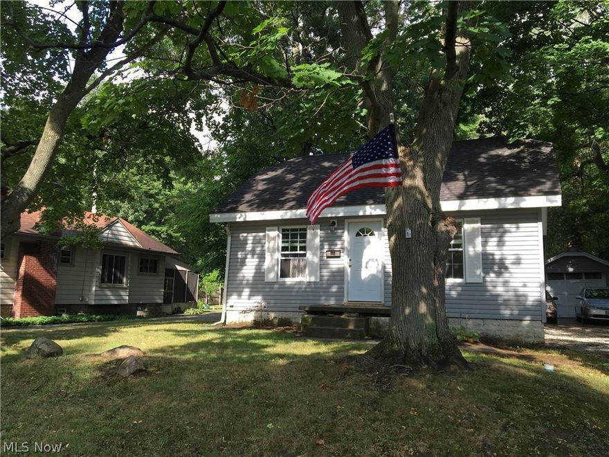 Welcome home to 3575 Franklin Rd.  Completely renovated in 2016.  All new dry wall, new insulation, new windows, roof, paint.  Charming original hardwood floors.  The kitchen has been completely renovated.  The bathroom is all new. Adorable, cozy living room with exposed brick chimney.  This lovely Stow home in this quiet neighborhood is close to everything, shopping, restaurants, schools, parks.   Beautiful wooded lot with covered patio. Call today to schedule your private showing.