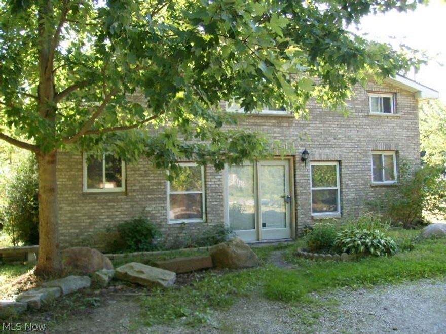 Unique, must see Lake Milton property located close to state park, lake, golf course and I - 76. Fabulous private yard and  quite street, large open floor plan. Great for year around living or a perfect weekend getaway home ! Call today for your personal tour.