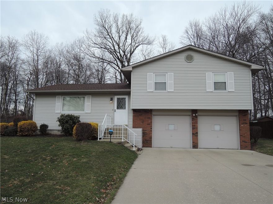 Spacious and move-in ready.....three bedroom home  in a great neighborhood (Seaborn Elementary  School on street behind). This home offers 2 full baths; large kitchen with all appliances, pantry with pullout drawers and a breakfast bar; large dining/eating area;  newer laminate floors in 2 bedrooms (double closets in master bedroom); and vinyl replacement windows.  The partial basement has glass block windows, sump pump, laundry room (washer/dryer stay) and lots of space for additional rec/room use (extra refrigerator in basement can stay) plus newer A/C.  2-10 Home Warranty offered.  So clean and ready for immediate occupancy.....don't miss this one!!