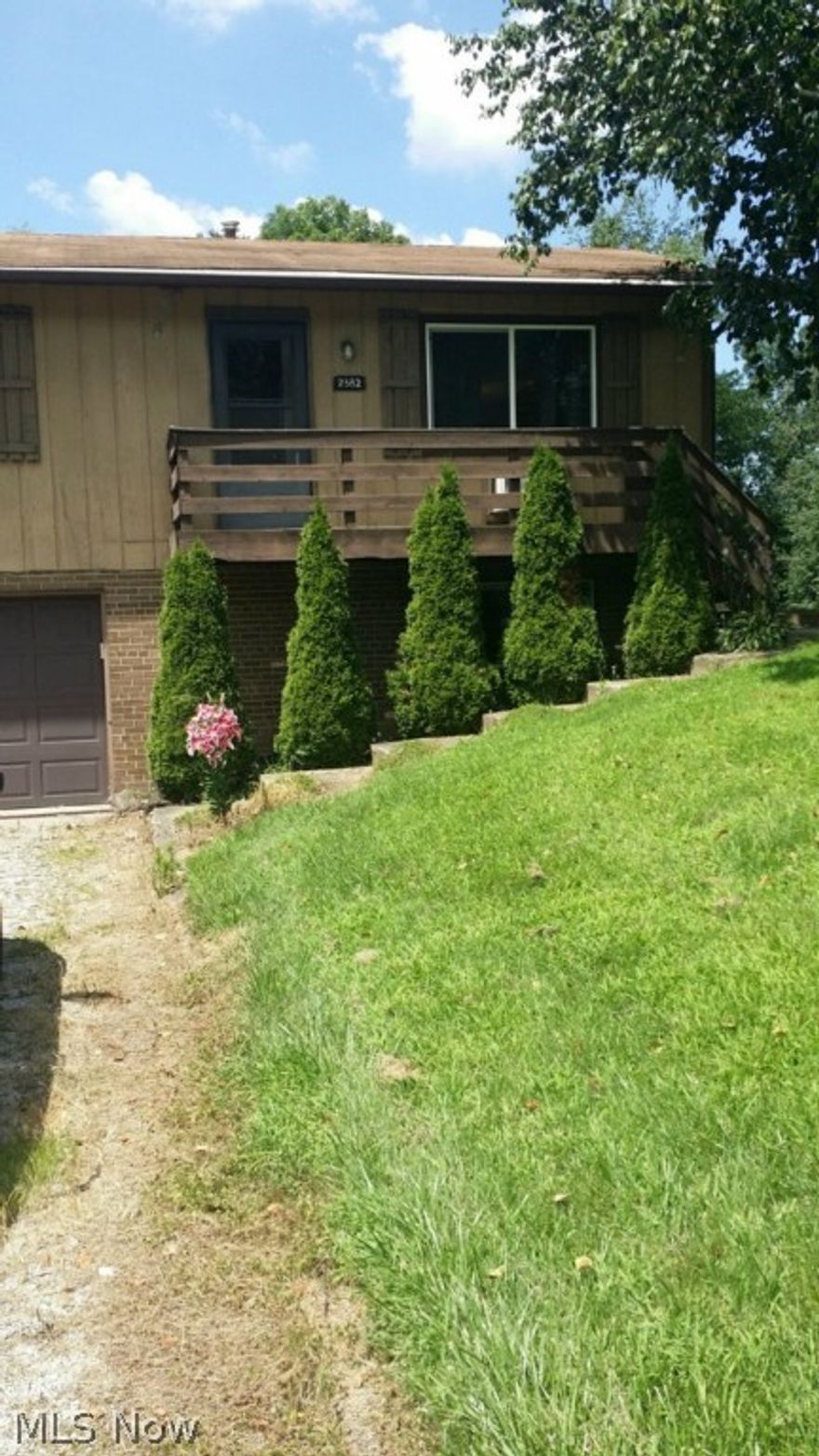 Very nice 2 bedroom duplex.  Many updates.  Very nice kitchen that is fully appliance.  Rec room in basement, laundry room complete with washer and dryer.  Kitchen has sliding glass doors leading to your own private deck.  This home has a large, beautiful yard that has a park like setting.  Attached garage and more.