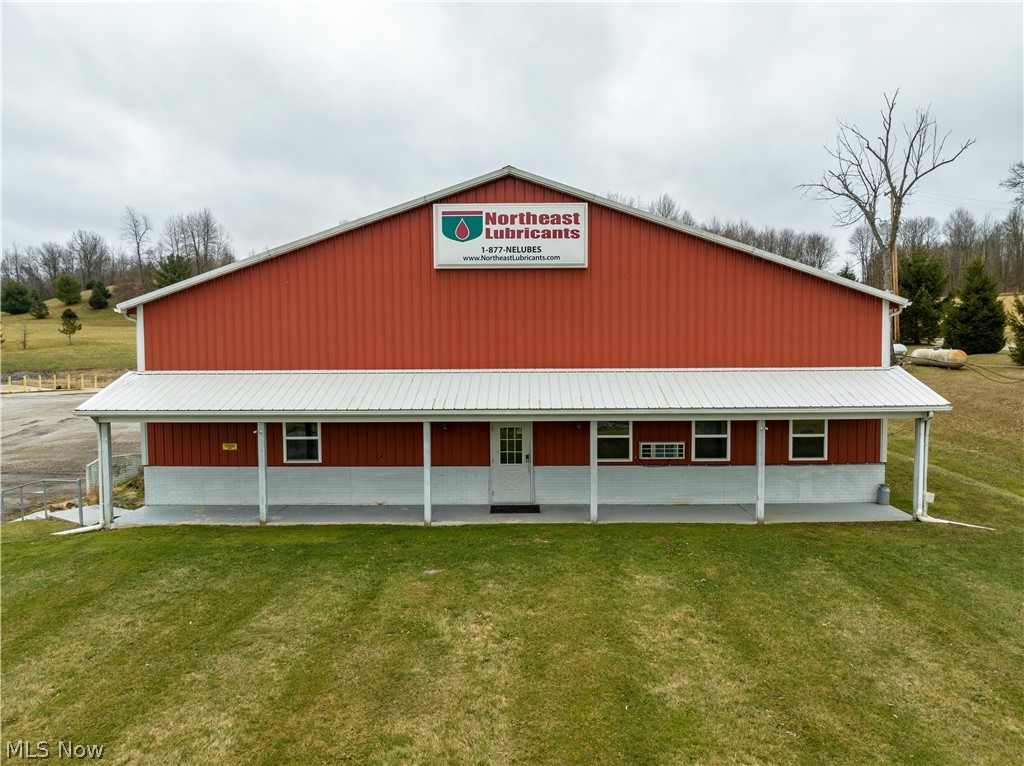 Newer commercial warehouse space! Upon pulling up, you'll notice a large sign, metal construction, and a gated gravel parking lot. Located on the east side of the property, there are two thick concrete pads. First is approx. 85'x40' Second is approx. 68'x23'. The south side of the exterior building has a 38'x12' 'lean-to' for extra storage. On the east side of the building, you'll notice one semi loading bay with 9' door. Also, one 14' door, and three 16' doors. Upon entering through the front office, you'll note the structure was built in two phases. One built in 2000, which is the front offices, & front half of the warehouse. The second phase was built in 2009 & is the back half of the building, electrical room, and firewall separating both areas. The 3 phase 480v electric as well as a 220v hookup gives plenty of room for any electrical needs. 16' & 18' ceilings respectively. Located conveniently between Cleveland and Pittsburgh. Property is on well & septic. Please reach out to lis