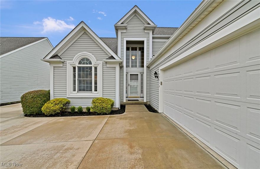 Discover this stunning home nestled in a quiet part of Olmsted Falls, offering a perfect blend of comfort and modern amenities. The grand two-story entrance foyer welcomes you into an open, airy layout accentuated by high ceilings, neutral colors, and abundant natural light from skylights in the great room. The main level features an inviting eat-in kitchen, an extra-large first-floor laundry room, and a dedicated pantry for ample storage. A spacious great room with a cozy fireplace, and a formal dining area with sliding doors that lead out to a lovely outdoor patio, ideal for entertaining.

The home boasts beautiful LVP flooring throughout and a luxurious first-floor primary suite with an attached bathroom. Upstairs, you'll find a versatile loft space perfect for an office or additional flex area. Also upstairs, enjoy a second spacious bedroom. 

The finished lower level offers two flexible office spaces, one equipped with surround sound wiring, perfect for working or relaxing. The house has a Blink e-doorbell that remains. Electric blinds on the entry window add a touch of sophistication.

Recent updates include a new driveway (2017), roof (2017), patio steps (2017), furnace (2018), and garage poly coating (2025). 

Schedule your private showing today and experience all that this beautiful property has to offer!