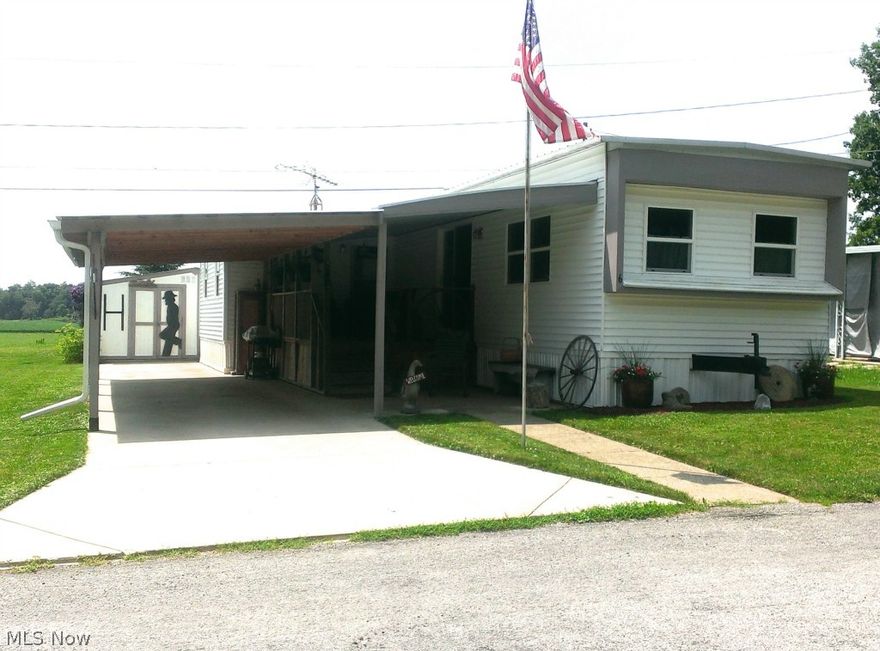 55 and older park. Lot rent $160.00 includes water, sewer and trash. Very nicely remodeled inside and out. 2nd bedroom is laundry and possible 3rd bedroom is a den with sliding doors to the rear deck. Gas heater in living room. Updates in last 5 years: roof, siding, windows, Trane AC, flooring, barn siding in living room, kitchen, bathroom and more.