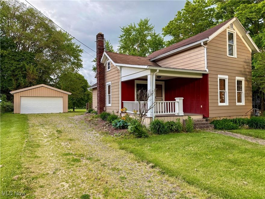 2 bedroom 1 bathroom beautiful home in historic Seville.  City lot plus 32 acre Cy Hewit park in the back yard! Bedroom on the second floor has a walk-in closet and the ceiling has 1 1/2 inch rough cut cedar! 2 car detached garage only 2 years old with electric and concrete floor. Updated HVAC systems. 1st floor bedroom. Enjoy the front porch and back deck looking out to the park.