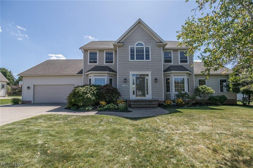 Welcome Home to this 4-5 Bed, 3.5 Bath stately Colonial in the sought-after Forest Lakes development in Kent, Ohio, centrally located between Stow & Kent. Lower Level has flexible additional living suite: Full Bath, bedroom, living space & kitchenette! This home will steal your heart with its well-appointed spaciousness, including 1000 Finished Sq. Ft. in the Lower Level which includes full bath, guest room, & family/media room with wall of cabinets/kitchenette! Set apart from common living spaces, the sizable library/office--with gorgeous built-ins--makes for a perfect "work from home" situation. Dining room w/ inlaid wood pattern floor and tray ceiling adds an air of sophistication. First Floor Laundry! Back yard is awesome with basketball pad and HUGE stained, stamped concrete open-air patio/veranda with incredible roof extension. Family Room adjacent to kitchen creates Open Concept space & boasts gas fireplace for those cold winter nights as well as beautiful window seat w/ storage