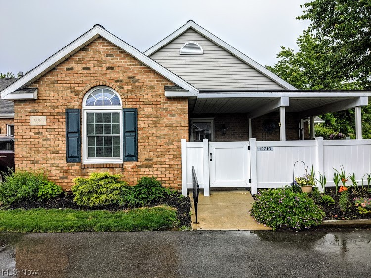 Beautifully landscaped and decorated condo with covered patio/porch. Two skylights to bring you blue skies during the day and starlight at night. This unit features larger then normal openings to facilitate wheel cars. I large enclosed and covered patio is very nice for entertaining or just enjoying nature. Close to Hartville and Belden Village Mall. This has a age restriction for older adults. Pets allowed. New Air conditioning unit installed in September 2020. All carpets and flooring professionally cleaned. Discloser was filled out by POA for that reason inspection is highly encouraged.
