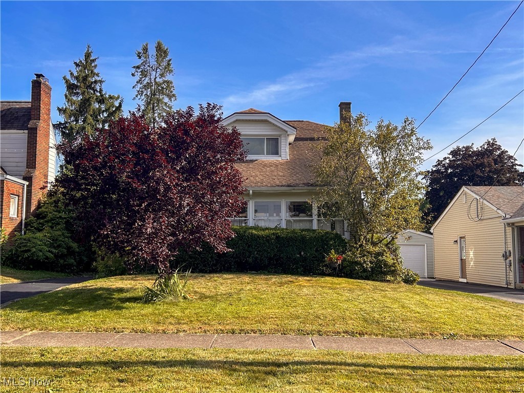Welcome to 71 Centervale in Boardman. This cutie is full of rustic charm with a wood finishes throughout. Enter in by the beautiful sun room, perfect for both plants and guests to lounge comfortably. This home could potentially stand as a duplex with an upstairs mother-in-law suite, freshly painted with open floor plan and a crisp new paint job! Downstairs compliments charm by warmth and glow in both dining and living areas. A beautifully updated bathroom divides two bedrooms, master holding an excellent walk-in closet. Dining area encased with beautiful finished wooden floor and unique windows accentuating natural lighting. Modern kitchen gives you a feel of Italy! Past the kitchen you can choose to head to the spacious outside deck to relax or head to the basement for hobby rooms with great potential for exercise equipment, and everyone's favorite, laundry! This home makes great for storage, all the way to the outside garage and covering! Note: new high efficiency furnace and air conditioning. Call your co-lister, Sam Rife, Realtor today with questions or to schedule your own private tour! God Bless you!