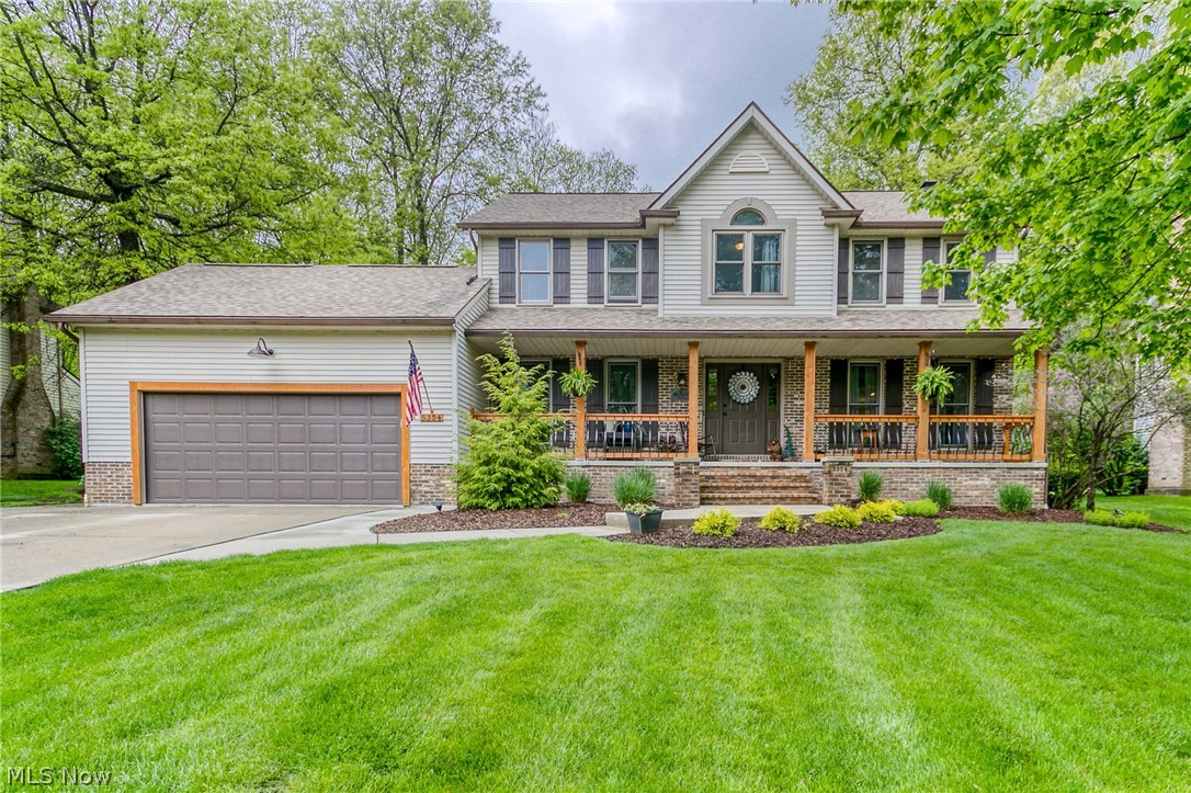 Welcome to 5354 Park Vista...This gorgeous home is everything you have been searching for! From the moment you pull in the drive you will fall in love with the curb appeal this home offers. Just off the foyer you will find the spacious living room that features a brick wood burning fireplace (gas line). Through the living area you will find a large eat in kitchen complete with quartz counter tops, stainless steel appliances and views of the beuatiful park like back yard. The formal dining features crown molding, chair rail and laminate flooring. There is a first floor half bath and laundry room which offers additional storage just off the kitchen. Upstairs you will never want to leave the master suite with a newly renovated bath. The bathroom has quartz countertops as well as a new tiled shower and tub surround and walk in closet. There are three additional bedrooms that share a full bath that has been updated with new counter tops and faucets. In the lower level you will find a family