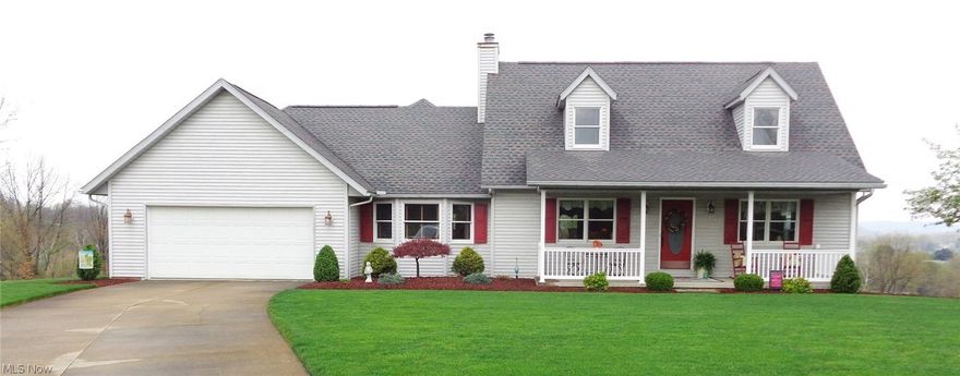 Must See!  Beautiful 3 Bedroom, 3.5 Bath, Cape Cod Home with an amazing view.  Large Eat in Kitchen and a Spacious Family Room with a gas fireplace and sliding door to deck w/ sun setter awning and back yard.  First floor Master Suite has large walk in closet, double sinks, Jacuzzi Tub and Stand up Shower.  First floor Laundry.  Finished Lower level with huge Recreation Room that walks out to deck and backyard.  Lots of closet and storage space.  Updated windows and roof in 2011.  Carpeting updated in 2012 and 2016 in bedrooms.  New Water Softener installed 2017.  Quiet cul-de-sac location in country setting just outside of town.