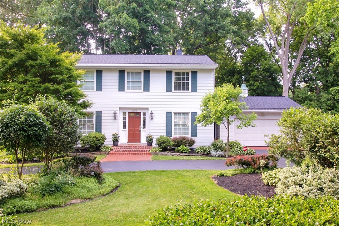 Stunning Center Hall Colonial in the heart of Concord! Curb appeal galore from the circular drive with lovely plantings to welcoming brick steps leading to front door. Foyer with hardwood floor is flanked by spacious living room with crown molding, and first floor office with built-in bookcase. Office could become a fifth bedroom. Formal dining room with chandelier and crown molding off of living room. Updated kitchen with granite counters, maple cabinetry and walk-in pantry is a home chef’s dream with newer Stainless Steel appliances. Incredible family room with cultured stone fireplace and tray ceiling with recessed lighting gives panoramic views of nature through oversized windows. French doors lead to the deck with natural gas line perfect to grill out, entertain and enjoy the park like, private yard. Back hall off of kitchen with garage access leads to updated half bath which is also adjacent to office. Take the gleaming hardwood stairs to second level hall with skylight and four