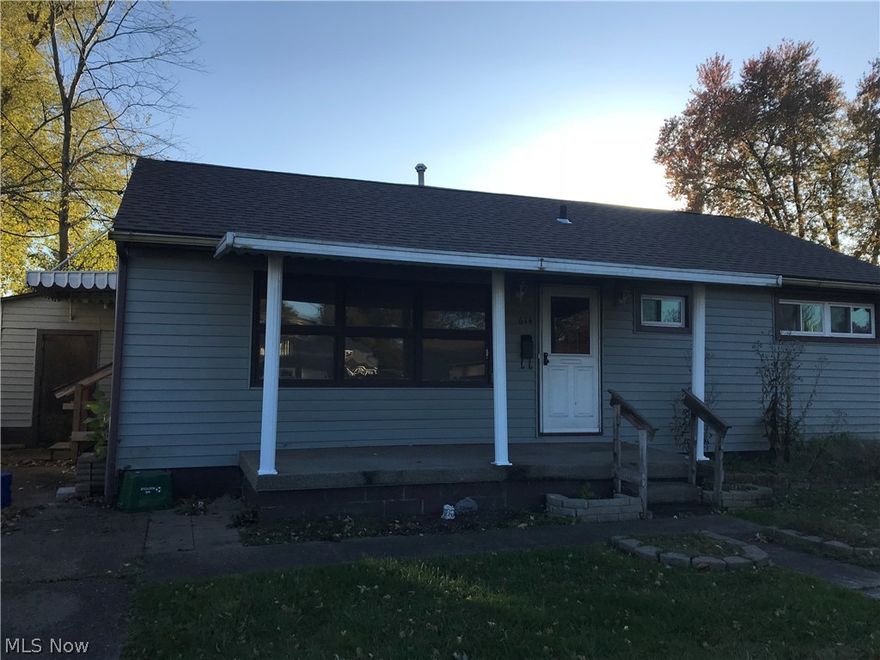 One story ranch with alley access and level yard.