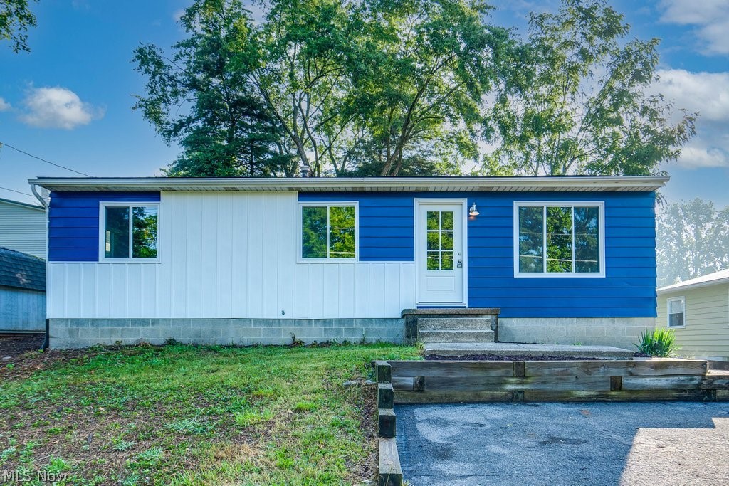 NOW, Look at This...Completely remodeled 3 bedroom ranch with 2+ car garage. Nearly everything is NEW in this gorgeous, carefully thought out and updated home. Awesome eat-in kitchen with a spacious island that provides plenty of extra storage and gathering opportunities. New stainless steel appliances polish off the kitchen. New cabinets, flooring, lighting and windows throughout including glass block in the basement. The bathroom is all new and FAB-U-LOUS with granite countertop, great tile work and new tub. NEW A/C 6/22. There's more...check out the oversized 2.5 car garage with NEW garage door, entrance door, roof and gutters...truly a BONUS!