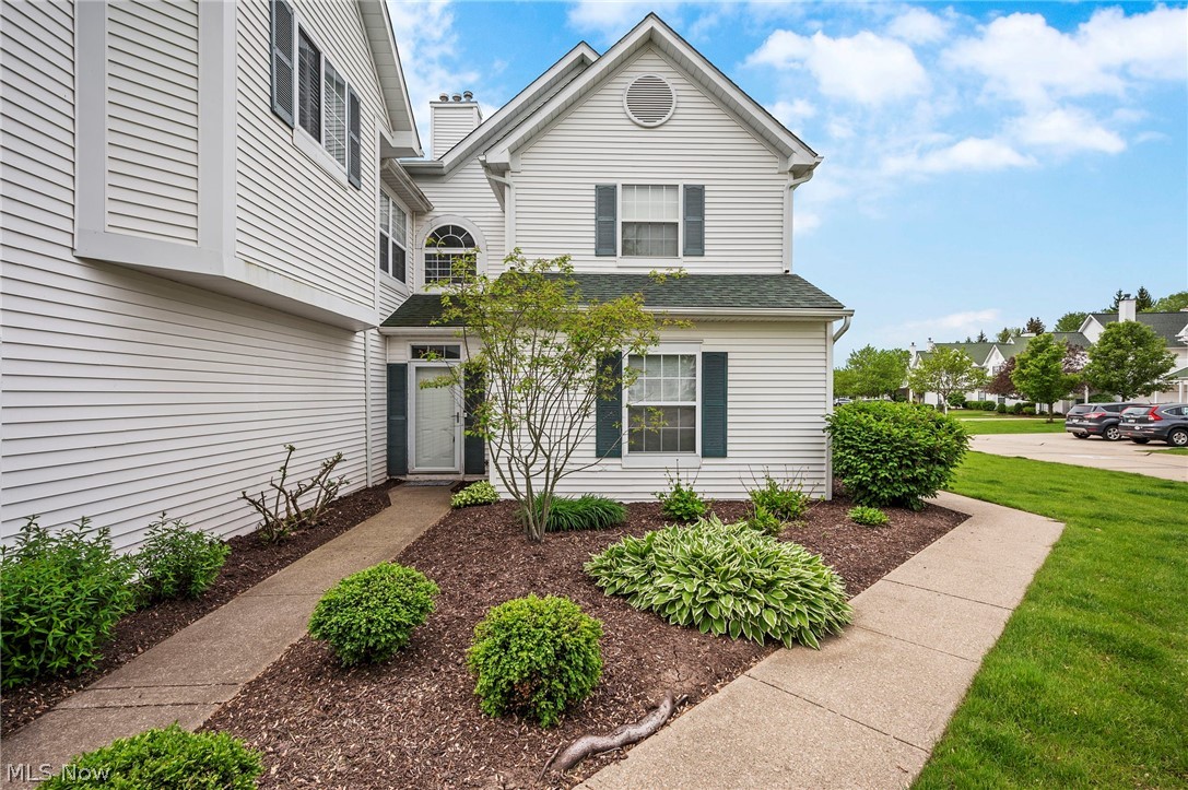 Welcome home to this beautifully updated single floor townhouse in the desirable View Point community. Upon entering, you will be greeted by vaulted ceilings that are accentuated by an abundance of natural light the flows through the home. The large living area also provides a formal dining area and a three-sided gas fireplace. The eat-in kitchen showcases white cabinetry with plenty of storage and counter space. The spacious owner's suite has a walk-in closet and an updated private bathroom. The second bedroom also provides plenty of closet space. The second full bath has also been recently updated. The laundry room has plenty of room for sorting and folding, as well as additional shelving. Outdoor living is a breeze with your own private deck off of the kitchen. The attached 2 car garage has plenty of shelving and room for additional storage. This home has seen many great updates recently. Hot Water Tank 2018, HVAC 2018, Roof 2020, Flooring 2022, Paint 2022, Some Lighting Fixtures 2022. Just a short drive to Rocky River Reservation, Crocker Park, easy highway access and a short walk next door to the North Olmsted Golf Club!