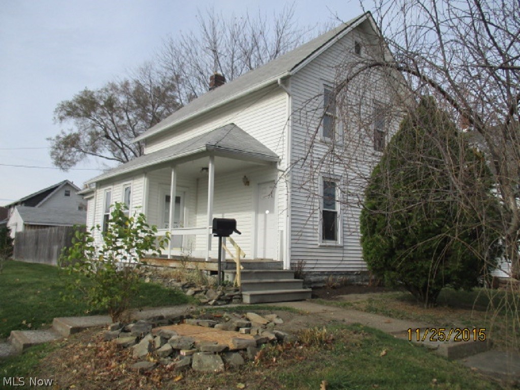 This is a HomePath property. Unique century-old colonial on corner lot in Lorain! Two-family living space. Ideal as live in one, use other as in-law suite or as investment property! First floor has light & bright living room space, kitchen area need full remodel. Spacious bedrooms and one bath. Upstairs can be accessed from first floor, or sealed off. Side entry to upstairs unit. Kitchen area, two bedrooms and full bath. Basement is shared with laundry hook-ups. Detached oversized garage. Fenced in back yard. Convenient location, close to shopping, schools and park.