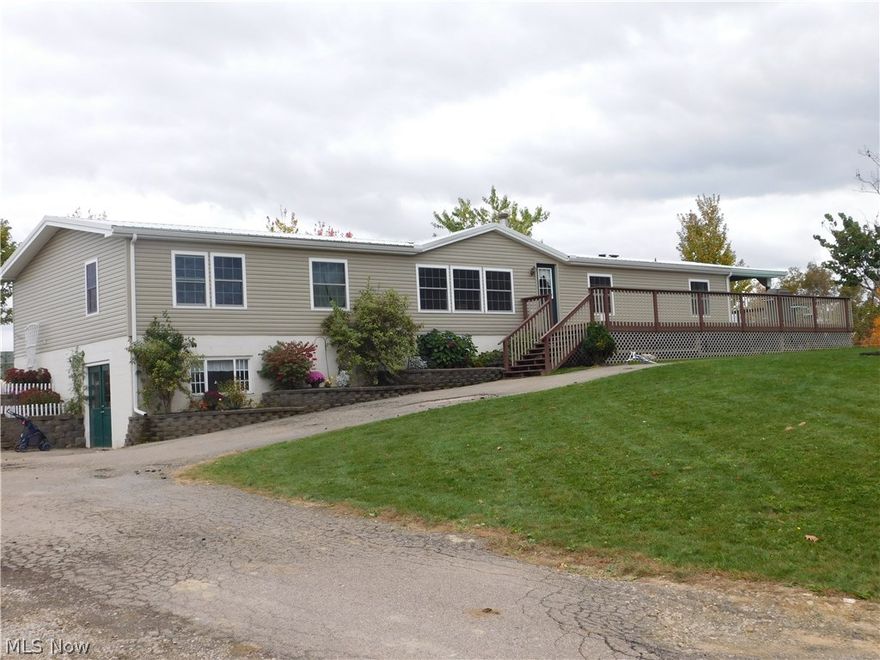 Looking for a mini-farm in the West Holmes School District? This secluded property consists of 4 bedroom home with walkout basement and 30' x 56' pole building with a 45' x 56' lean to. The home features a large master suite, kitchen, dining room, living room and a full walkout basement. Home has a metal roof and a covered deck.The pole building offers a shop area and a barn with 5 box stalls. The lean to is an open area to house livestock. There are 3 separate gated pastures with thru-way access to each one. The swing set,2 storage buildings, and the solar power system do not stay. Don't miss this excellent offering and call for your private showing today.