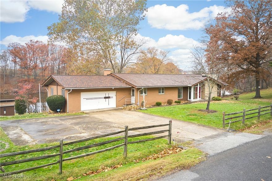 Discover the potential of this spacious 4-bedroom, 2.5-bath home boasting over 2,900 square feet of living space. This solidly built property is ready for your creativity and personal style. Step through the grand entryway into the main level, where you’ll find
two bedrooms, one and a half baths, a welcoming living room with a wood-burning fireplace, and direct access to a back deck overlooking a serene pond. A spacious eat-in kitchen provides ample room for friends and family to gather. The primary bedroom is
generously sized and also opens onto the deck, offering peaceful water views. The fully finished lower level expands your possibilities with 2 additional bedrooms, an office or craft room, full bath, recreation room, and a full walkout for easy indoor-outdoor living. This level also features an impressive two-story Bonus Room, complete with a wood-burning fireplace and a bar, ideal for events, gatherings, or large parties. With abundant space, natural beauty, and so much potential, this home offers a rare opportunity to create something truly special. Call today for a private tour.