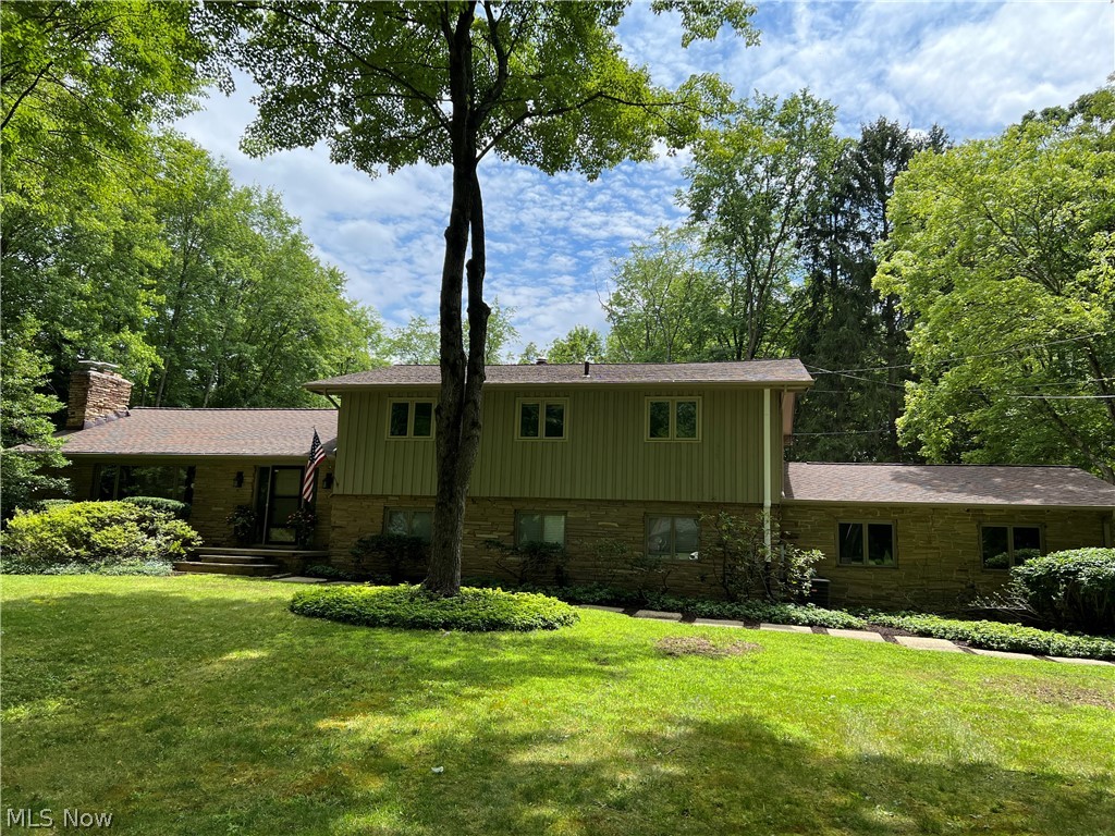 Located in the sought after Revere school district, near shopping and freeways, and nestled on a quiet cul de sac, this 4 bedroom, 2 1/2
bath home offers a rare opportunity. This impressive split level home was built in 1968, lovingly lived in by 1 family, and just fully
renovated with exceptional finishes and superb flowing design throughout. Enjoy Summers outdoors in the private fenced backyard
with in ground swimming pool and beautiful landscaping. The open floor plan allows entertaining a pleasure with a gourmet kitchen
featuring all new stainless steel appliances, large eating area with sliding glass doors to the pool and patio area, an Amazing Great room
with high ceilings and stone fireplace, and the dining room also has sliding glass doors to the pool and patio area. Upstairs is the master
bedroom, 3 additional bedrooms, and all with beautiful hardwood floors and large closets. The lower levels include a family room with
sliding glass doors to pool and patio area and 1/2