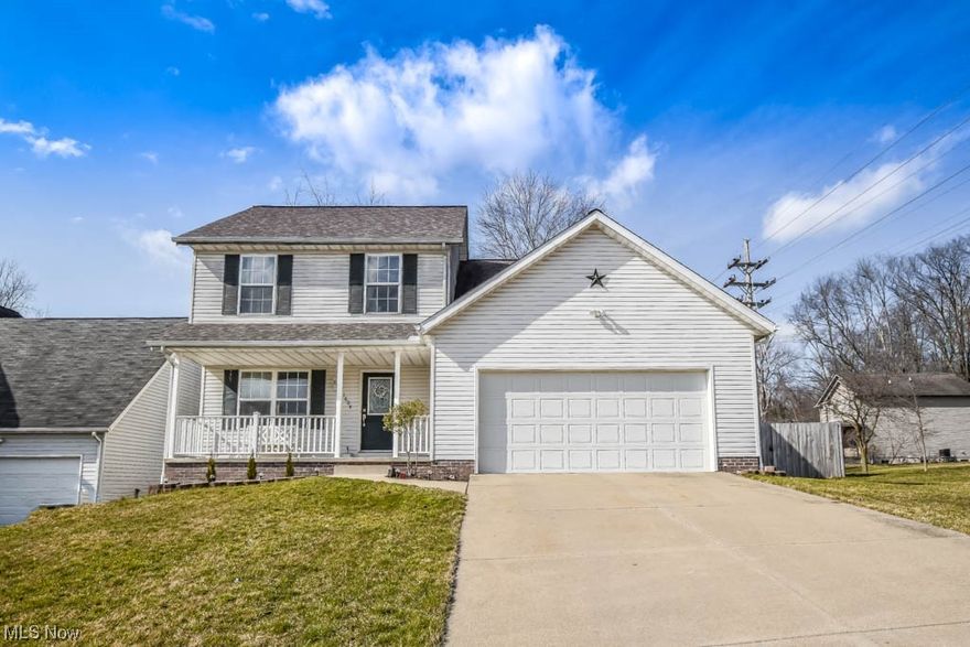 Beautifully renovated 4 bedroom, 2.5 bath home in Eagles Run!  An inviting front porch welcomes you inside to the fresh and modern interior complete with Life Proof high-quality vinyl flooring that continues throughout the main level.  The family friendly layout keeps everyone connected between the living room, dining room and updated kitchen with soft close Shaker style cabinetry and stainless steel appliances. Just off the kitchen is a family room with a cozy gas fireplace and sliding patio door that opens to the fully fenced backyard!  A guest bath rounds out the 1st floor. Upstairs you'll find 4 bedrooms and 2 full baths.  The master includes a walk-in closet and a private bath with the secondary bedrooms sharing the full bath off of the hall. The full basement adds a laundry area with plenty of space for your storage needs.  All of this plus a fantastic cul de sac location in Ellet schools and easy access to all amenities.  Don't miss out, call to schedule a showing today!