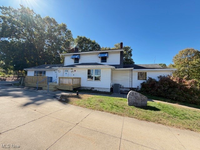 Endless possibilities and prime exposure! This nostalgic 3,000 sq. ft. commercial property sits on nearly 3 scenic acres along the Tuscarawas River in Springfield Township and is zoned C-3 (multipurpose use)—perfect for retail, office, mixed-use, or home-based business. Currently configured as two units—one ranch-style (approx. 1,936 sq. ft.) and one colonial (approx. 2,064 sq. ft.)—offering flexible space for an owner-occupant or investor, or the potential to lease to two tenants.? The property includes public water and sewer, three newer furnaces, mini split A/C, sprinkler and suppression systems, security system, electric updates, water softener, and holding tank. There are five bathrooms, a walkout basement with utility room, and a half garage door for storage access. The deck and accessibility ramp were updated in 2025.? Outside, you’ll find ample parking with 11 marked spaces (including one handicap space), two separate entrances with connected pull-through drive, and multiple outbuildings and 4 garages for storage or expansion.? Bonus opportunity: An established pet grooming business could be negotiable with the sale, including all equipment and an existing customer base of approximately 1,000 clients.? Whether you’re expanding an existing business, opening a new venture, or seeking a versatile investment with high visibility on Massillon Road, this property delivers location, flexibility, and incredible potential.