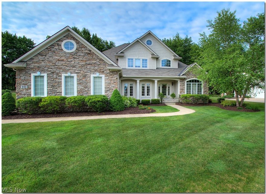 A HOME OF DISTINCTION ***JUST STEP INTO THE FOYER AND YOU KNOW YOUR HOME ***FRENCH DOORS LEAD TO A WONDERFUL OFFICE ***GREAT ROOM WITH SOARING CEILINGS, SURROUND SOUND, COZY FIREPLACE FLANKED BY TWO PALLADIAN  WINDOWS ***SPACIOUS EAT IN KITCHEN WITH WALK IN PANTRY, GRANITE COUNTERTOPS, CUSTOM TILE BACKSPLASH.RECESSED LITES, BUTLER PANTRY, STAINLESS APPLIANCES, MELLOW NATURAL CHERRY CABINETS WITH UNDERMOUNT LITES ** FRENCH DOOR TO CUSTOM PAVER PATIO ***SUN SPLASHED DINING ROOM WITH FLOOR TO CEILING WINDOWS , CROWN MOLDING AND WAINSCOTING, BEAUTIFUL WINDOW TREATMENTS AND WARM WOOD FLOORING ***MASTER BEDROOM WITH VAULTED CEILING , RELAX IN YOUR OWN SPA BATH WITH WHIRLPOOL TUB AND PRIVATE SHOWER , PLENTY OF CUSTOM  CLOSET SPACE ***SECOND LEVEL OFFERS 3 LARGE BEDROOMS, ONE WITH PRIVATE FULL BATH AND BUILT IN WINDOW SEAT AND BOOKCASES  AND THE OTHER SHARES A JACK AND JILL BATH ALL WITH 3 FT. HIGH VANITY'S***SCONCES LINE THE HALL ***COZY FRONT PORCH, GUTTER GUARDS, 3 CAR GARAGE, SPRINKLER SYS