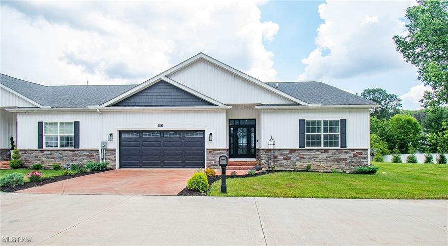 Welcome home to this stunning 2022 move-in ready condo located in the desirable Pin Oaks Development! Step into a spacious foyer that opens into a bright and airy open-concept main level, perfect for both relaxing and entertaining. The heart of the home is the expansive kitchen, featuring an abundance of cabinetry, sleek stainless steel appliances, and generous counter space. Just off the kitchen, the inviting living room offers a cozy fireplace and sliding glass doors that lead to the back deck — the ideal spot for morning coffee or summer evenings. A designated dining area completes the flowing layout. Retreat to the gorgeous owner’s suite, complete with a large walk-in closet and a luxurious en-suite bathroom. Two additional generously sized bedrooms, a full hall bath, and a convenient half bath provide plenty of space for family, guests, or a home office. Additional highlights include first-floor laundry, ample closet space throughout, and a full studded basement ready for finishing — offering the potential for even more living space. The two-car attached garage adds everyday convenience and extra storage. Don’t miss this rare opportunity to own a modern, low-maintenance home in one of the area's most sought-after communities!