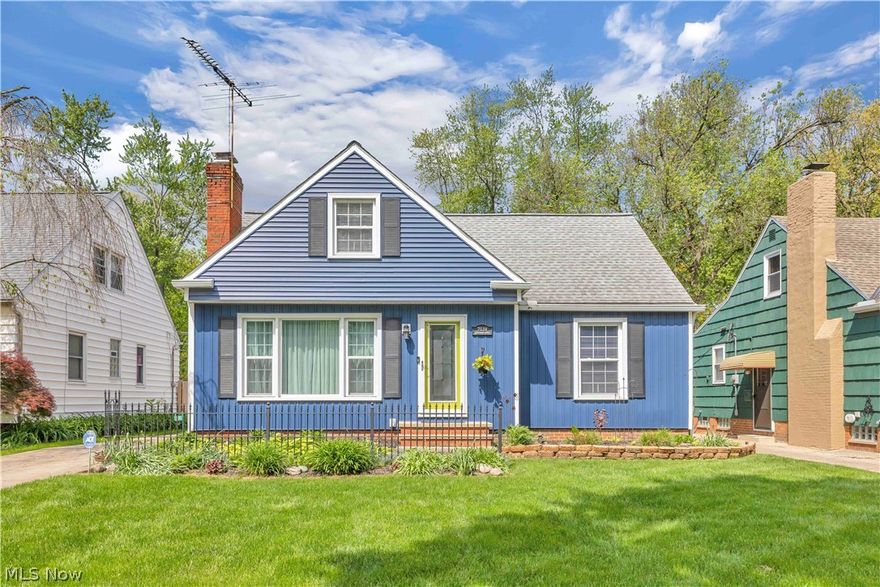 Charming 1950s Bungalow adorned by a 100-year-old wrought-iron fence! Over 1,500 square feet. Pleasant, quiet neighborhood near the parkway... Gorgeous landscaping and pride of ownership are evident. Spacious living room features delightful hardwood floors and a wood burning stove; modern eat-in kitchen with updated cabinetry, corian countertops and a tile backsplash; enjoyable first floor addition with sliding doors to large deck offers multiple options. First floor master bedroom has a large closet and the main bath includes a walk-in shower. Large dormer up has a nice sized third bedroom, bonus room and convenient half bath. Full unfinished basement with glass block windows, pleasing back yard and two car detached garage. Minutes to I-71 and conveniences. Vinyl replacement windows, vinyl siding (2021), roof (2020) & gutters (2019). One year limited home warranty.