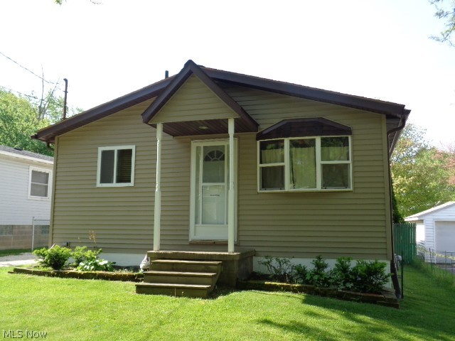 Welcome home to 1070 Annapolis Ave. Akron, Ohio 44310! Peacefully located on a dead end street! This home has many updates for you to enjoy such as a partially fenced in yard, updated kitchen with appliances, windows and siding in 2013,2 car garage built in 2014, glass block windows in basement, 2018, roof 2011 with gutter guards, bathroom in basement installed in 2014, finished basement in 2018 and main bath remodeled in 2014. Act now to enjoy your new yard this summer. The finished basement features a gas fireplace, full bath and spacious rec room. This is a great place to hang out or could serve as additional living space if needed. Call today for your private showing and start packing!