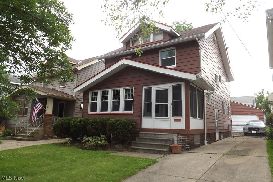 Large Traditional Colonial. Solid Home on a nice Tree lined street. Charm and Character throughout.  Hardwood flooring, natural woodwork, crown molding. Formal Dining Room with lead glass built in Cabinets. Large Kitchen with all appliances staying.  Many updated windows.  2 Fireplaces. Full Basement with a finished rec/bar room and an updated full bath. 3 Large Bedrooms on the Second Floor along with an updated full bath. Oversized 2 car garage. Enclosed Front Porch.  Fenced Yard. Walk up Attic. Close to Highways, Bus line, Shopping and more. One year Home Warranty provided.